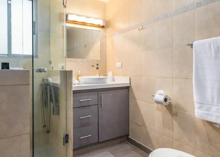 Elegant With Brand-new Fixtures, Shaded Tropical Terrace, And Secluded Access